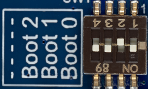 STM32MP157x-EV1 boot switches microSD card.png